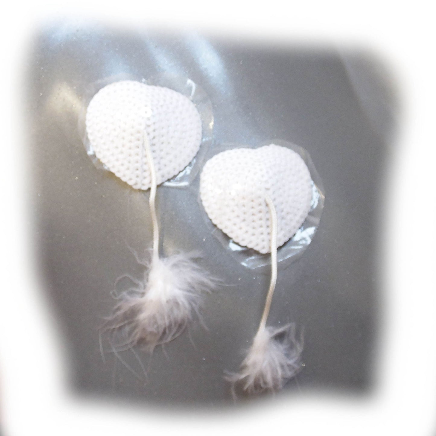 Nippel Cover Herz mit Pailletten und Feder
