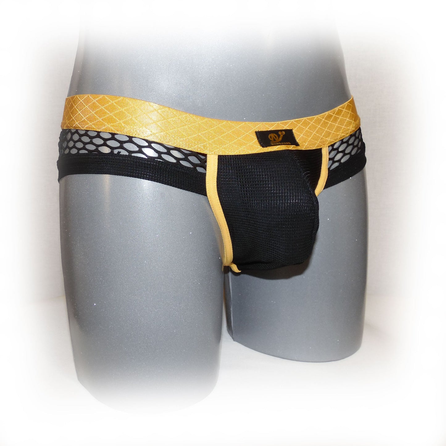 Pants with contrasting seam and mesh fabric