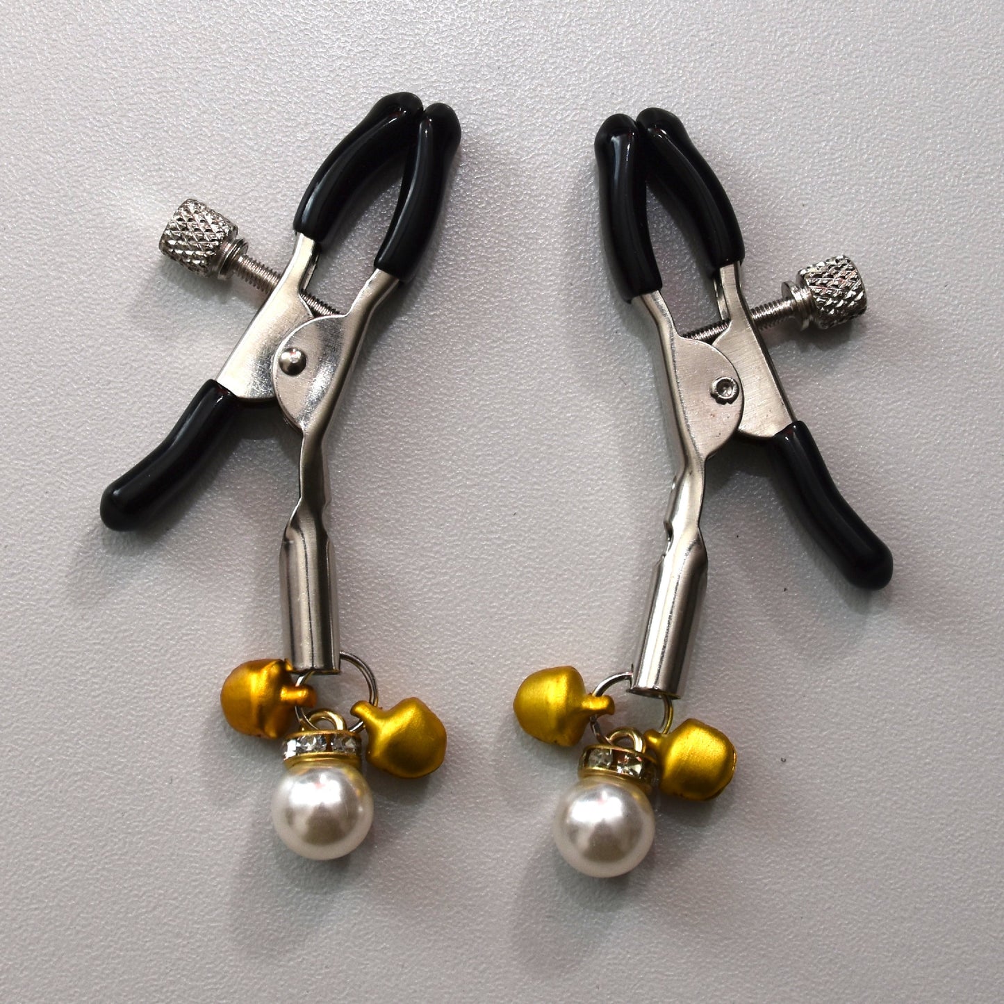 Nipple clamps with bell and pearl