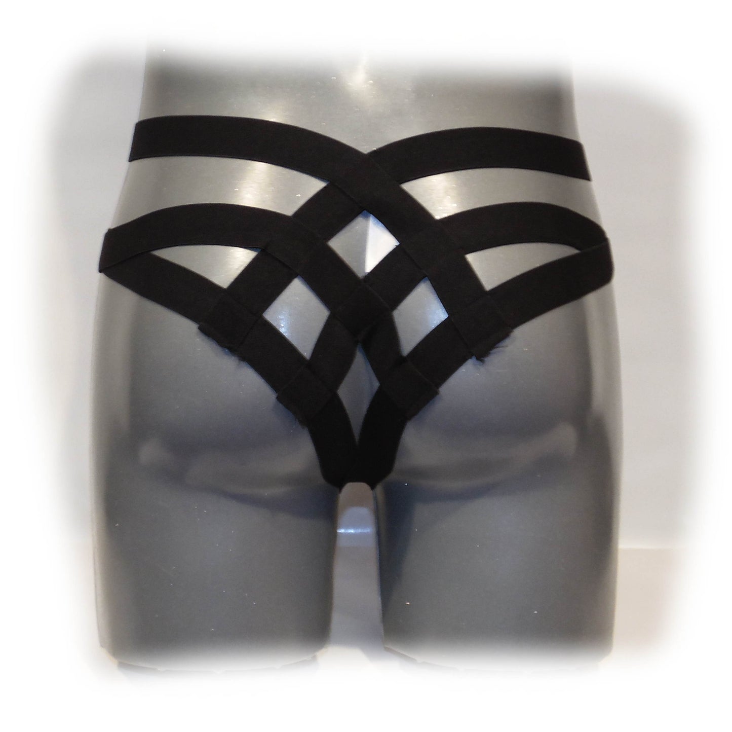 Black thong with cage bandage
