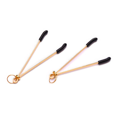 Black strong Mimi nipple clip in needle shape, gold
