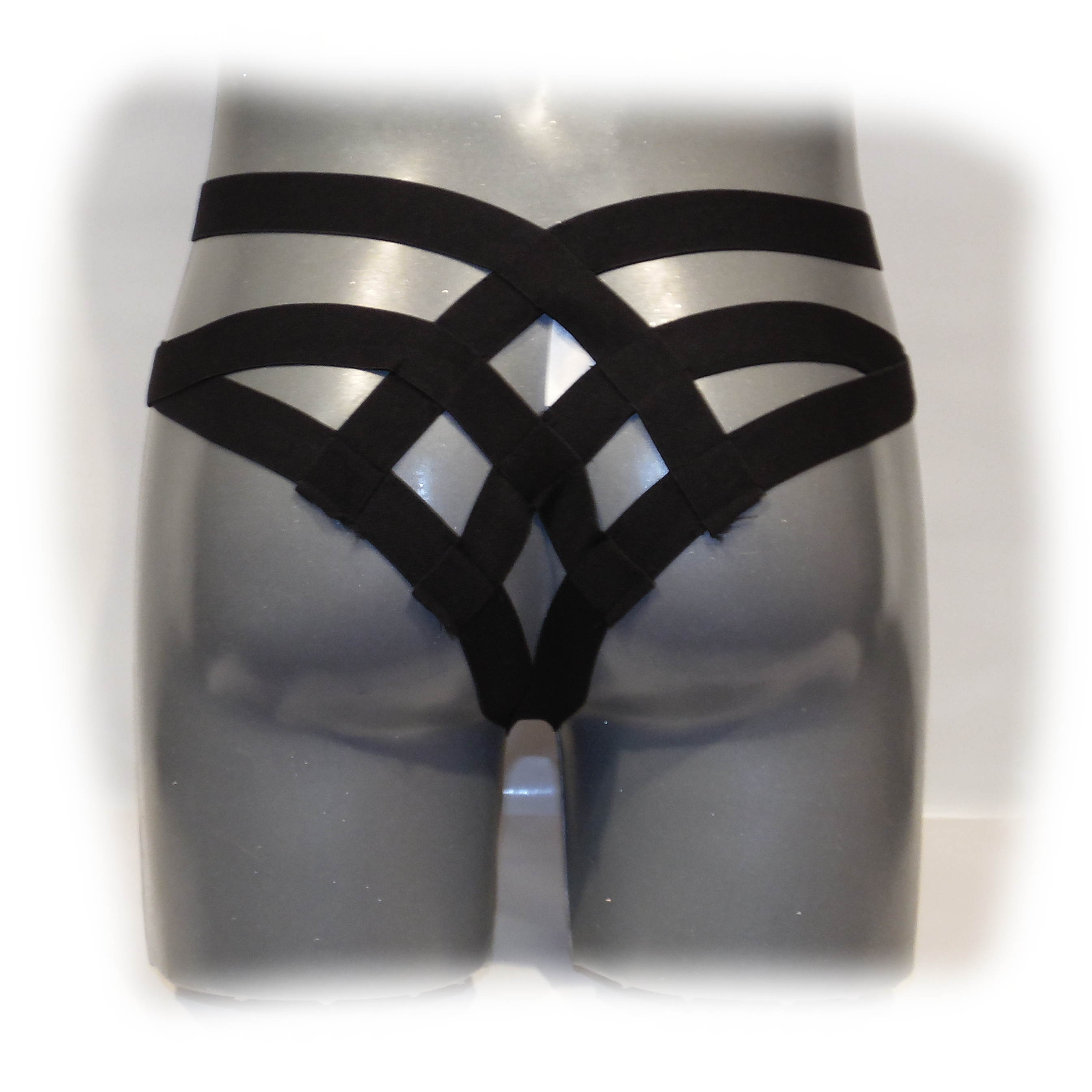 Black thong with cage bandage